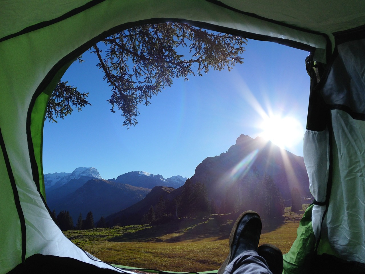 Looking at nature through the doorway of a tent